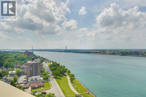 Riverfront view with bridge and park - 1225 Riverside Unit# 409 Windsor