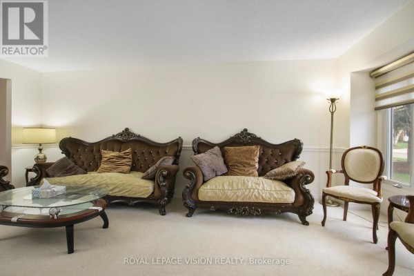 Finished basement with a recreation area, wet bar, and ample storage space. - 123 Chesham Avenue, London North