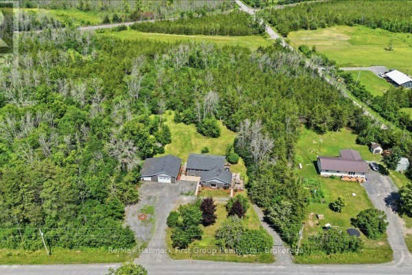 Two homes, garages and wooded lot - 1233 Lazier Road Tyendinaga