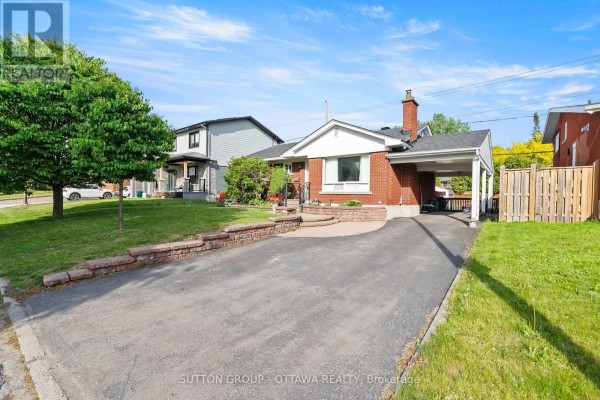 Wooden deck with outdoor furniture and a grill, overlooking a backyard with a shed. - 1237 Whitmore Avenue, Ottawa