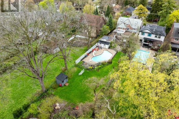 Backyard with two pools, cabana, shed, and mature trees - 124 Blythwood Road Toronto