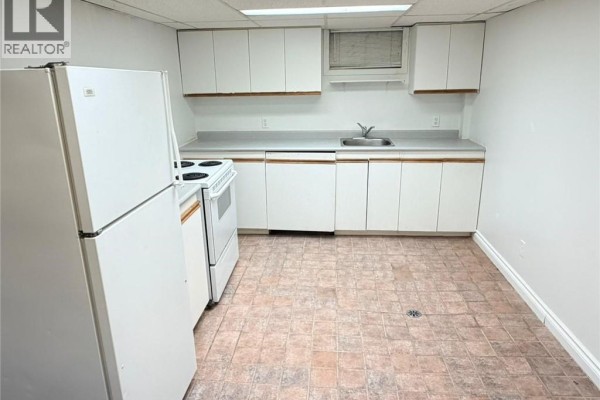 Another angle of the kitchen with appliances and sink - 124 King Street N Unit# 4, Waterloo
