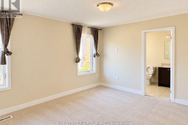 Bedroom 2 - 124 Vanier Street, Whitby, ON L1R0N3 Photo 5