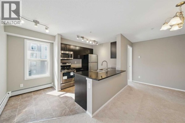 Living room - 1240, 81 Legacy Boulevard Se, Calgary, AB T2X2B9 Photo 5