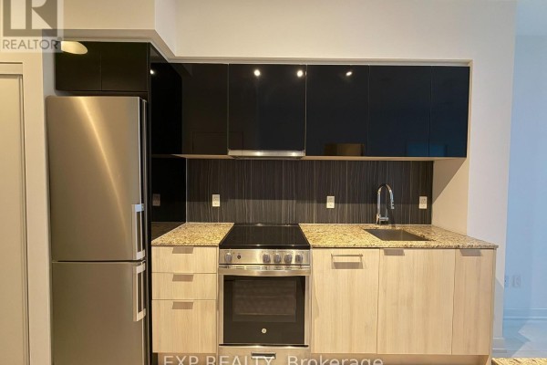 Kitchen - 125 - 31 Tippett Road, Toronto, ON M3H0C8 Photo 3