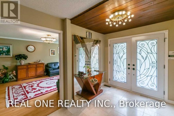 Family room - 125 Briarwood Road, Markham, ON L3R2X1 Photo 4