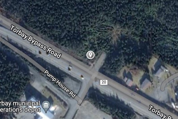 Aerial view of an intersection with Torbay Bypass Road, Pump House Rd, and a highway with buildings and trees. - 126a Quigleys Lane, Torbay