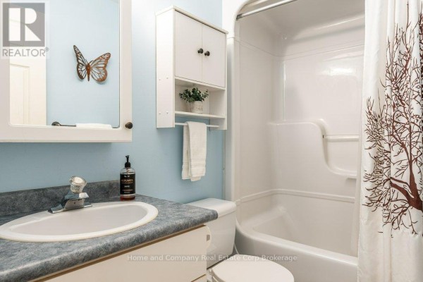 Purple bedroom with two white bi-fold doors and a guitar case - 127 Walsh Crescent Stratford