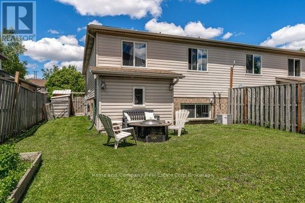 Bedroom with bed, dressers, TV, and window - 127 Walsh Crescent Stratford