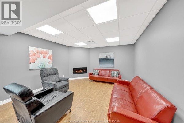 Family room/Fireplace - 12745 Lemire Street Unit# Lower, Tecumseh, ON N8N4V9 Photo 2