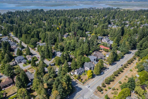 Overhead drone shot of residential houses and tree-lined streets in Surrey. - 12765 22 Avenue, Surrey