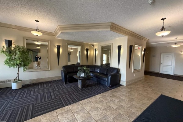 Family room - #128 16807 100 Av Nw Nw, Edmonton, AB T5P4Z6 Photo 4