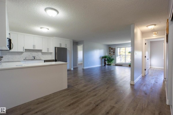 Kitchen - #128 279 Suder Greens Dr Nw, Edmonton, AB T5T6X6 Photo 3