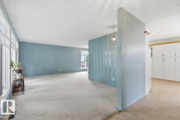 Family room - 128 Green Ash Dr, Wetaskiwin, AB T9A2H8 Photo 4