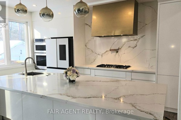 Family room - 128 Melrose Avenue, Wasaga Beach, ON L9Z2T1 Photo 5