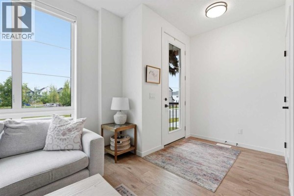 Living room - 129 Treeline Avenue Sw, Calgary, AB T2Y0S1 Photo 4