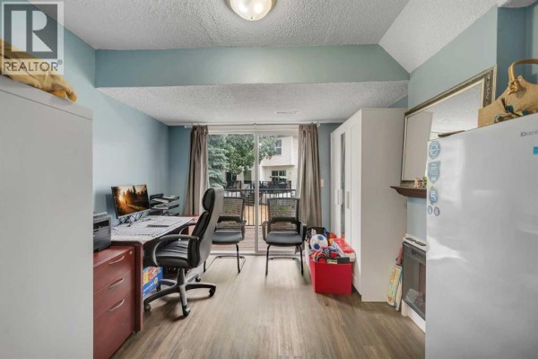 Living room - 13, 200 Hidden Hills Terrace Nw, Calgary, AB T3A6E8 Photo 5