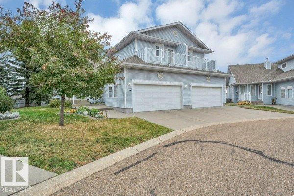 Bedroom 2 - #13 65 Cranford Dr, Sherwood Park, AB T8H1W5 Photo 5