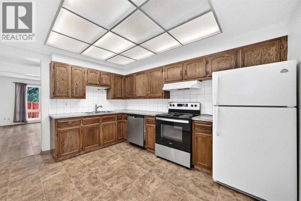 Living room - 130, 330 Canterbury Drive Sw, Calgary, AB T2W1H6 Photo 4