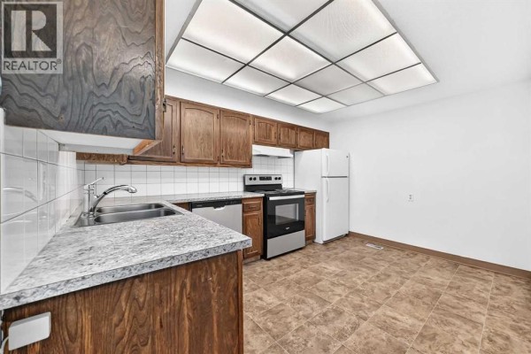 Primary Bedroom - 130, 330 Canterbury Drive Sw, Calgary, AB T2W1H6 Photo 5