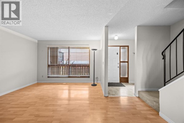 Living room - 130 Macewan Park Way Nw, Calgary, AB T3K3E7 Photo 4
