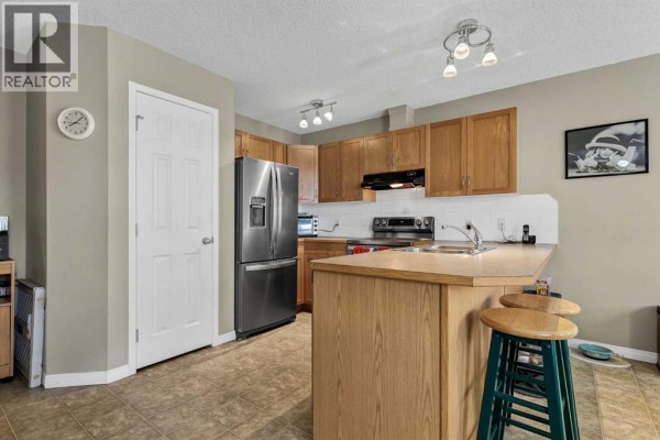 Laundry room - 1302, 800 Yankee Valley Boulevard Se, Airdrie, AB T4A2L3 Photo 4