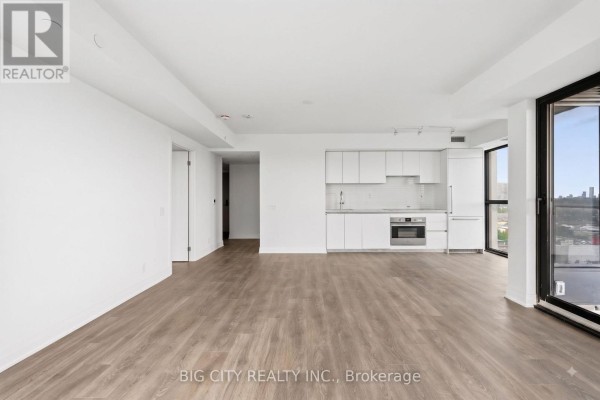 Living room - 1302 - 25 Frederick Todd Way, Toronto, ON M4G0C9 Photo 3