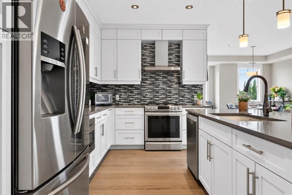 Living room - 1303, 2330 Fish Creek Boulevard Sw, Calgary, AB T2Y0L1 Photo 5