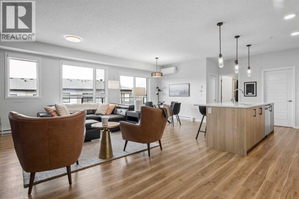 Living room - 1303, 42 Cranbrook Gardens Se, Calgary, AB T3M3N9 Photo 3