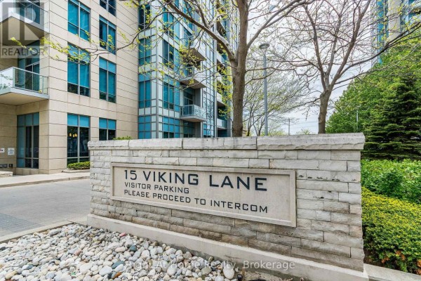Stone monument sign for 15 Viking Lane with instructions for visitor parking. - 1303 - 15 Viking Lane, Toronto