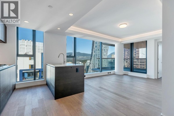 Bright open-concept living area with city views and large windows - 1303 1408 Robson Street, Vancouver