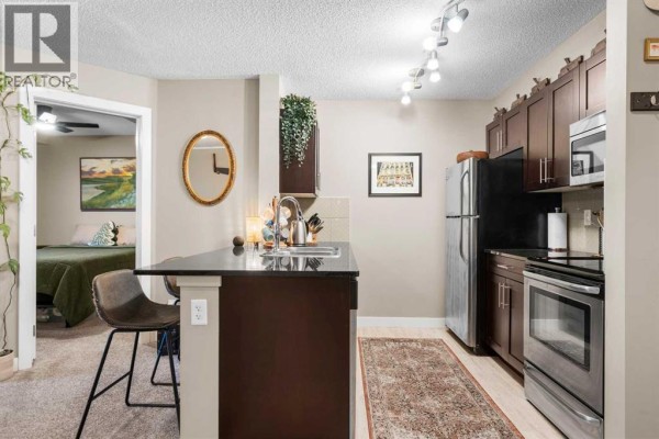 Primary Bedroom - 1304, 81 Legacy Boulevard Se, Calgary, AB T2X2B9 Photo 5