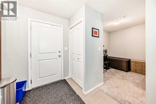 Bedroom - 1305, 403 Mackenzie Way Sw, Airdrie, AB T4B3V7 Photo 5