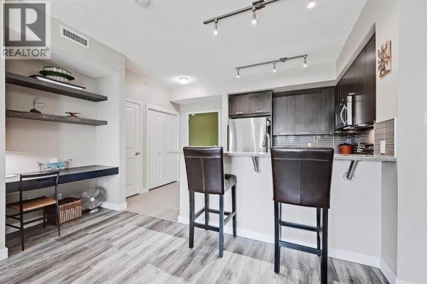 Bedroom - 1309, 175 Silverado Boulevard Sw, Calgary, AB T2X0V5 Photo 3