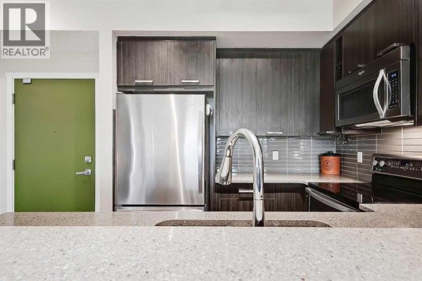 Kitchen - 1309, 175 Silverado Boulevard Sw, Calgary, AB T2X0V5 Photo 4