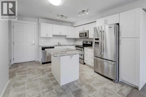 Primary Bedroom - 1310, 99 Copperstone Park Se, Calgary, AB T2Z5C9 Photo 4