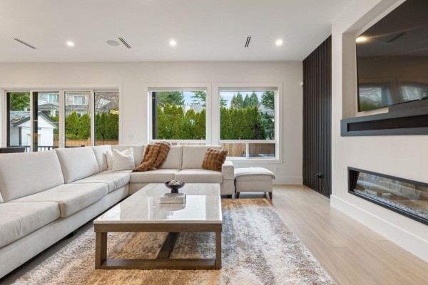 Floor plan for a multi-level house with room dimensions and square footage summary. - 13125 14 Avenue, Surrey