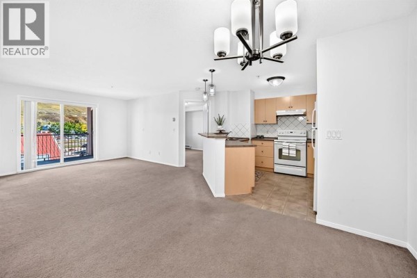 Dining room - 1316, 505 Railway Street W, Cochrane, AB T4C2K9 Photo 3