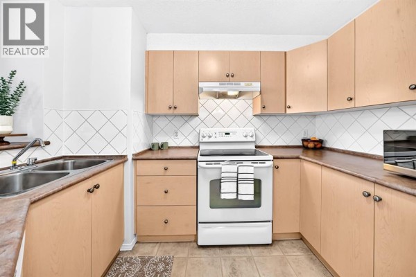 Laundry room - 1316, 505 Railway Street W, Cochrane, AB T4C2K9 Photo 5