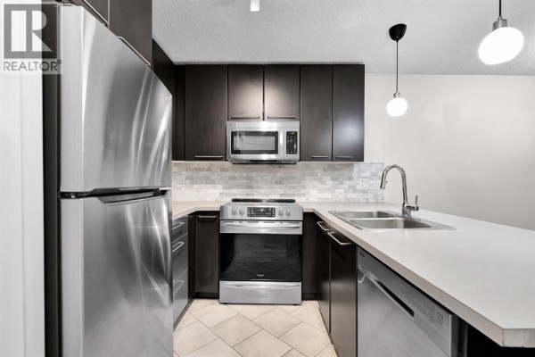 Primary Bedroom - 132, 35 Richard Court Sw, Calgary, AB T3E7N9 Photo 5