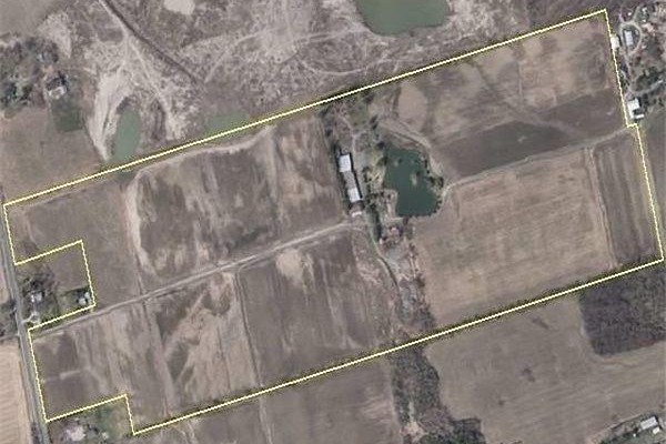 Aerial satellite view of a large farm property with fields and buildings. - 13291 Warden Avenue, Whitchurch Stouffville