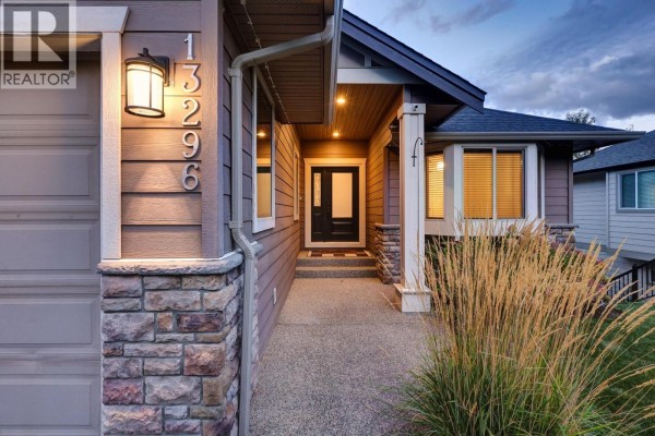 Close-up of the front entrance with address number 13296 on the house. - 13296 Lake Hill Drive, Lake Country