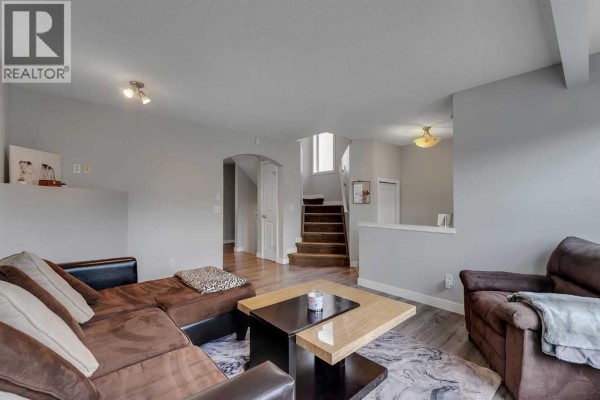 Living room - 133 Covebrook Close Ne, Calgary, AB T3K6J5 Photo 5