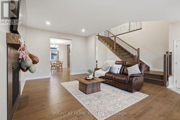 Interior view of the foyer with double white doors and a glass-paneled front door. - 1334 Fribourg Street, Russell