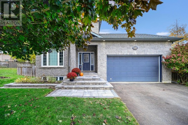 Welcoming foyer with tile flooring, office space, and natural light - 1337 Cuthbertson Avenue, Brockville