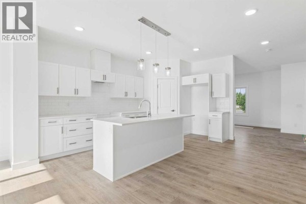 Kitchen - 134 Heartland Street, Cochrane, AB T4C3L9 Photo 4