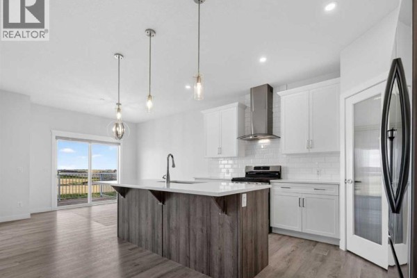 Den - 134 Hotchkiss Manor Se, Calgary, AB T3S0J5 Photo 2