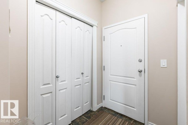 Kitchen - #135 16807 100 Av Nw, Edmonton, AB T5P4Z6 Photo 3