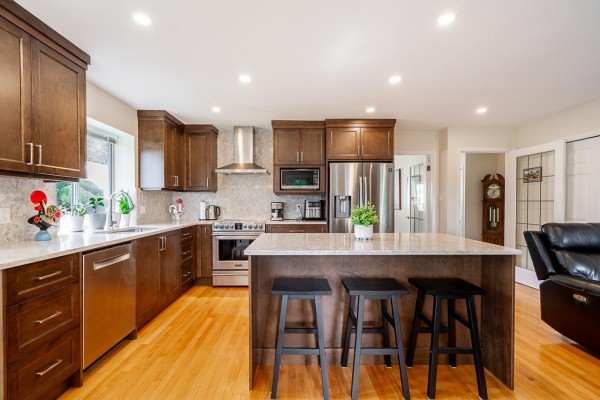 Floor plan of a 1,739 sq. ft. house with three bedrooms and two bathrooms. - 13560 15a Avenue, Surrey