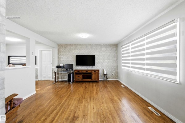 Family room - 13604 90a St Nw, Edmonton, AB T5E3N8 Photo 4